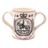 A Royal Doulton pottery loving cup, commemorating the Coronation of Her Majesty Queen Elizabeth II 1
