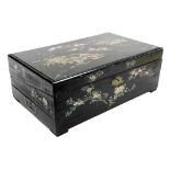 A Chinese black lacquer writing slope, decorated with mother of pearl and tortoise shell inlay in th