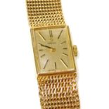 Withdrawn pre sale by vendor - An Omega lady's 9ct gold cased wristwatch, rectangular dial with gold