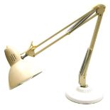 A late 20thC cream and white Anglepoise type table lamp.