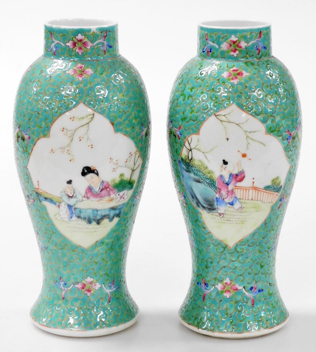 A pair of Chinese Republic famille rose porcelain vases, of baluster form, decorated with reserves o - Image 3 of 6