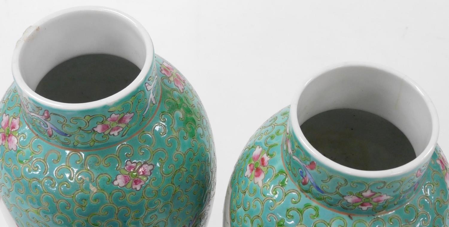 A pair of Chinese Republic famille rose porcelain vases, of baluster form, decorated with reserves o - Image 5 of 6