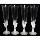 A set of four Sasaki Wings crystal champagne flutes, the clear tapering flute within a frosted glass
