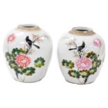 A pair of 20thC Chinese famille rose porcelain ginger jars, covers lacking, painted with magpies and
