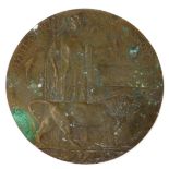 A WWI widow's penny, named to Arthur William Wright.