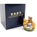 A Halcyon Days Harrods enamel and porcelain bonbonniere, box number 25, 6cm high, boxed.