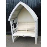 An AFK cream painted wooden two seater bench arbour, 206cm high, 138cm wide, 82cm deep.