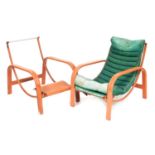 A pair of Art Deco aluminium aeroplane chairs, designed by Christie Tyler, with orange painted frame