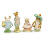 Four Beswick Beatrix Potter figures, comprising Little Pig Robinson, The Old Woman Who Lived In A Sh