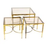 A vintage late 20thC brass nest of occasional tables, each of square form inset with a glass top, la