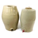 Two early 20thC buff glazed stoneware barrels, 34cm and 39cm high.