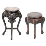 A late 19thC Chinese hardwood and marble topped urn stand, carved with bamboo, raised on cabriole le
