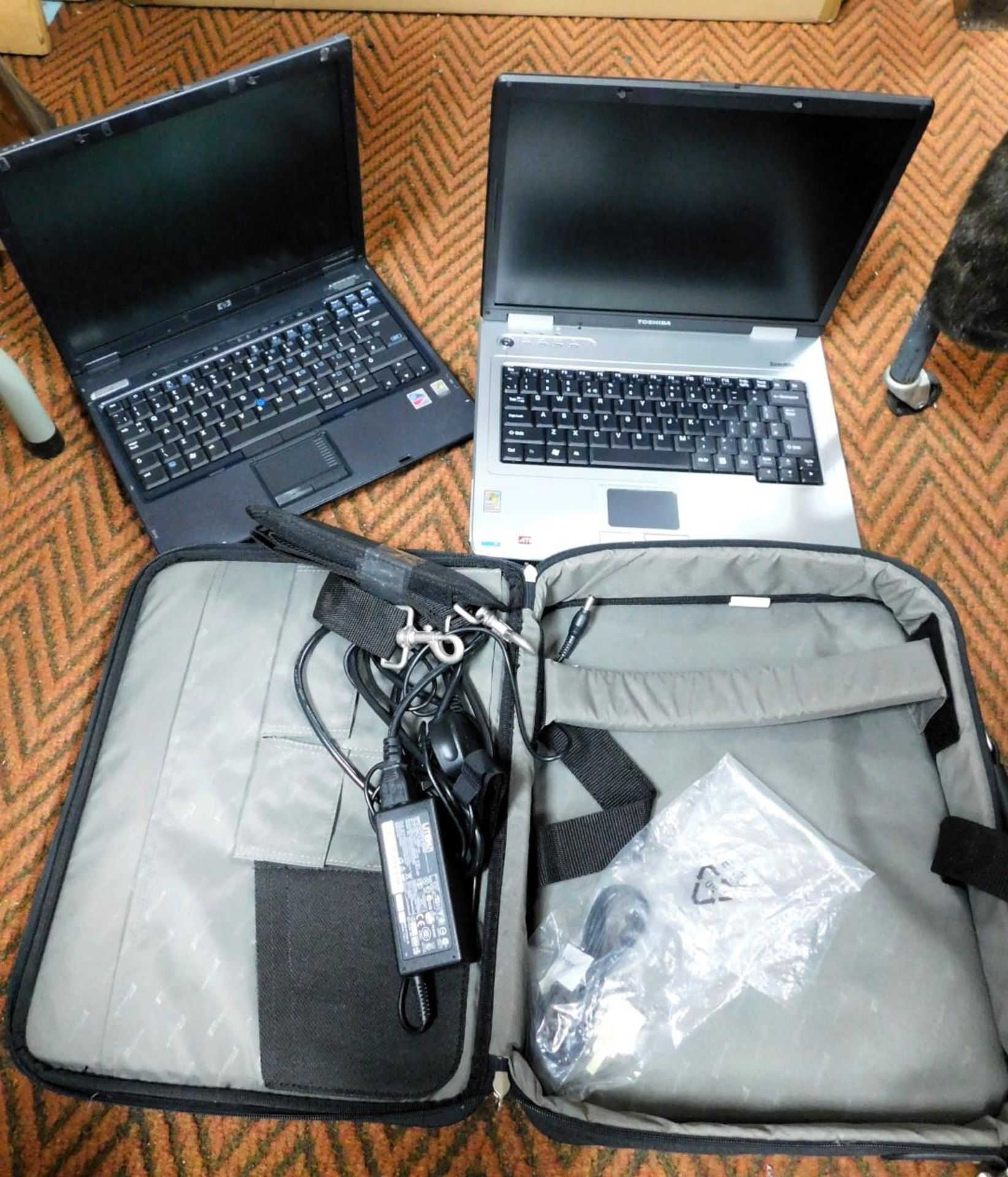 Two mini laptops, and a carry bag.