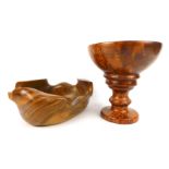 Two carved hardwood bowls, comprising a Creaciones Pimfa fruit bowl, 24cm diameter, and a burr walnu