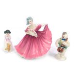 A Royal Doulton figure modelled as Elaine, HN3307, together with a Royal Doulton figure Daddy's Girl