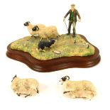 A Border Fine Arts sheep figure group, untitled, depicting shepherd, sheep dog and four sheep, on wo