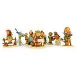 A collection of Goebel Hummel figures, and two Goebel birds. (11)