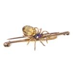 A spider bar brooch, the spider with citrine and amethyst, in yellow metal, on a yellow metal single