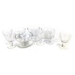 A set of six Stuart Crystal liqueur glasses, together with four Stuart crystal custard bowls.