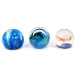 Three glass paperweights, comprising GES Neptune number 8, Caithness Ocean Spring 333/1500, and a Se