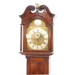 A Georgian mahogany longcase clock, by Joseph Fenn of London, the brass break arch dial, with cherub