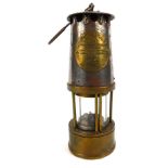 A Protectors Lamp & Lighting Eccles miners lamp, Type SD, No 99, with swing handle, 23cm high.