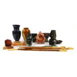 A group of hardstone wares, comprising a rose bowl, 8cm high, two vases, 15cm and 11cm high, carved