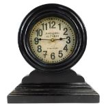 An Antique de Paris mantel clock, in a painted black wooden frame, with Arabic numeral dial, 33cm hi