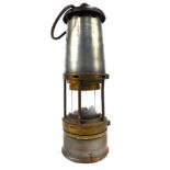 A Wolf Safety Lamp miners lamp, Maurice Ltd, Sheffield, No 7RMBS, with swing handle, 26cm high.