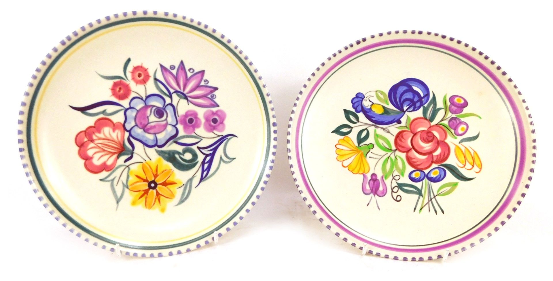 Two Poole Pottery collectors plates, one with turquoise border, and one with purple border, each 23c