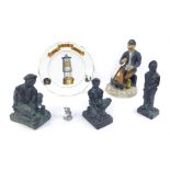 A group of mining related items, to include three cold cast figures, depicting coal miners, two in k