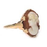 A 9ct gold shell cameo dress ring, with oval cameo depicting maiden on thin band, ring size L, 2g.