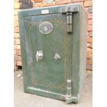 A Samuel Withers and Co green cast iron safe, 77cm high, 54cm wide, 50cm deep, with key.