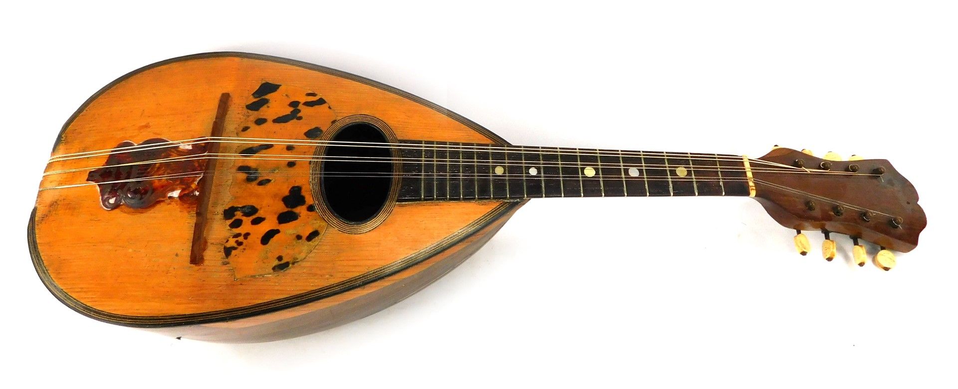 A Neopolitan mandolin, with tortoiseshell applied detail, with an ebonised stem and bone tuning pins