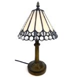 A Tiffany style small table lamp, with a cream and clear glass beaded shade, on metal frame, 41cm hi