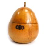 A Georgian treen fruitwood tea caddy, modelled as a pear with stalk finial, the hinged lid enclosing