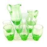 A 20thC green Art glass lemonade set, comprising jug, 24cm high, six glasses and further green glass