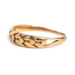 A 9ct gold dress ring, of cross weave design, with V splayed shoulders, cut, 1.7g.