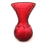 A Lalique cranberry glass vase, decorated in the Arabesque pattern, of waisted form, signed to under