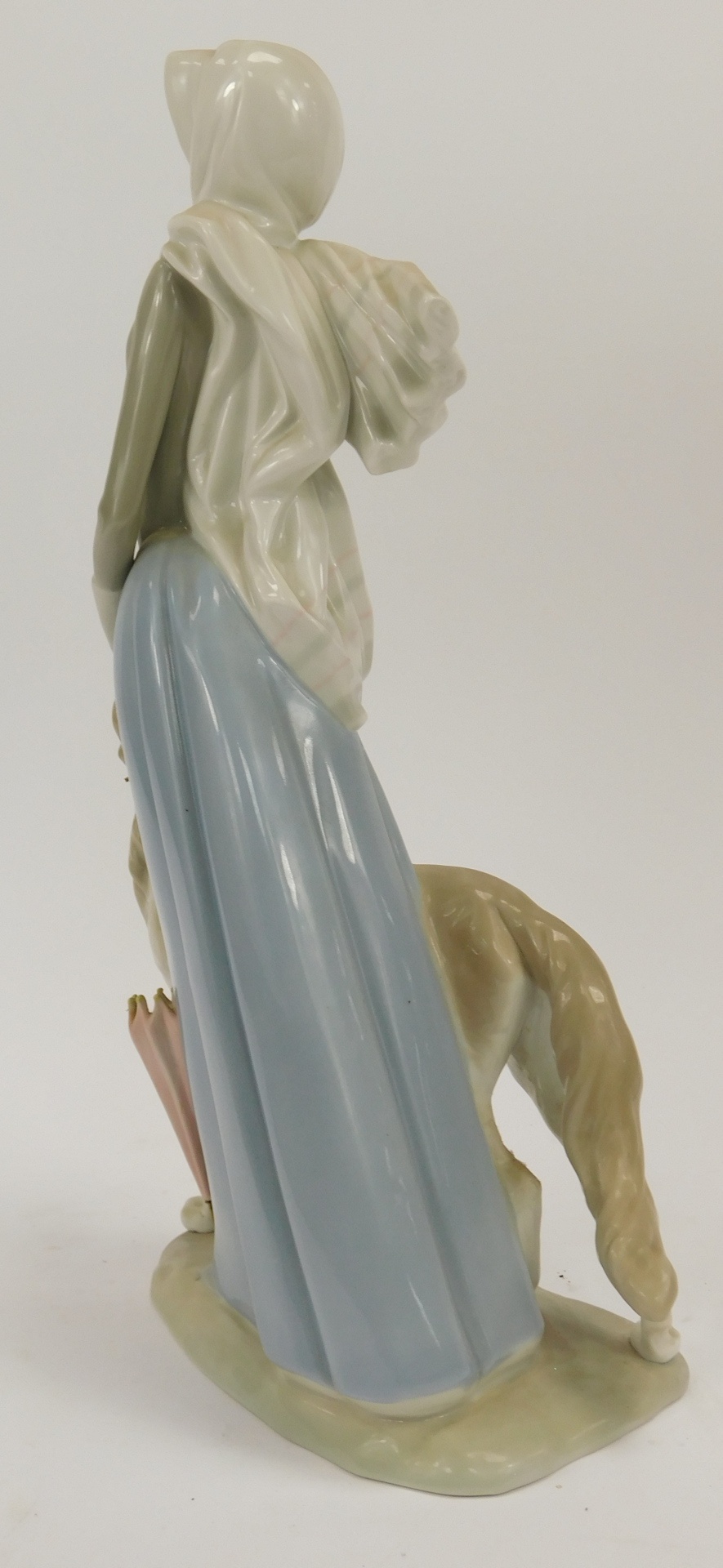A Lladro figure group of a lady walking dog, with umbrella and wearing scarf, 39cm high, 22cm wide. - Image 3 of 4
