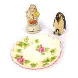 A Staffordshire figure of a lawyer, 9cm high, a Shelley transfer printed shell capped butter dish, 1