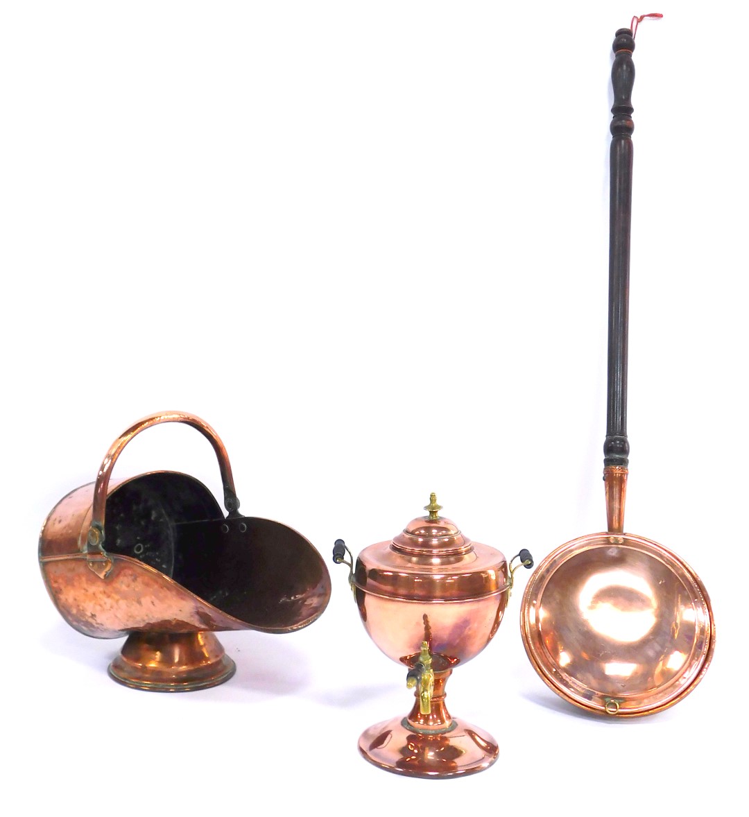 A group of 19thC copper ware, comprising a copper warming pan, copper coal helmet with swing handle,
