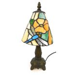 A Tiffany style small table lamp, with cream dragonfly and orange flower shade, 30cm high.