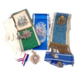 A group of Masonic regalia, comprising a Manchester Unity of Odd Fellows medallion, white gloves, bl