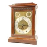 A late 19thC German mahogany bracket clock by Winterhalder & Hofmeier, with pierced fret back, and a
