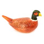 A 20thC pottery tureen and cover, modelled in the form of a pheasant, 15.5cm high.