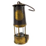 A Protection Lamp & Lighting Company Eccles mining lamp, No 115, with swing handle, 24cm high.