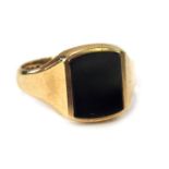 A 9ct gold signet ring, with rectangular black agate panel, on a plain band, ring size T, 5.1g all i