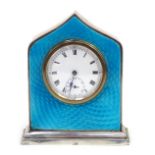 A George V silver and blue guilloche enamel desk clock, the enamel Roman numeric dial with subsidiar