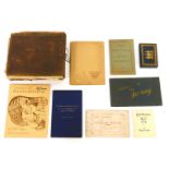 An early 19thC Holy Bible, dated 1817, (AF), a cased set of presentation playing cards, in blue leat